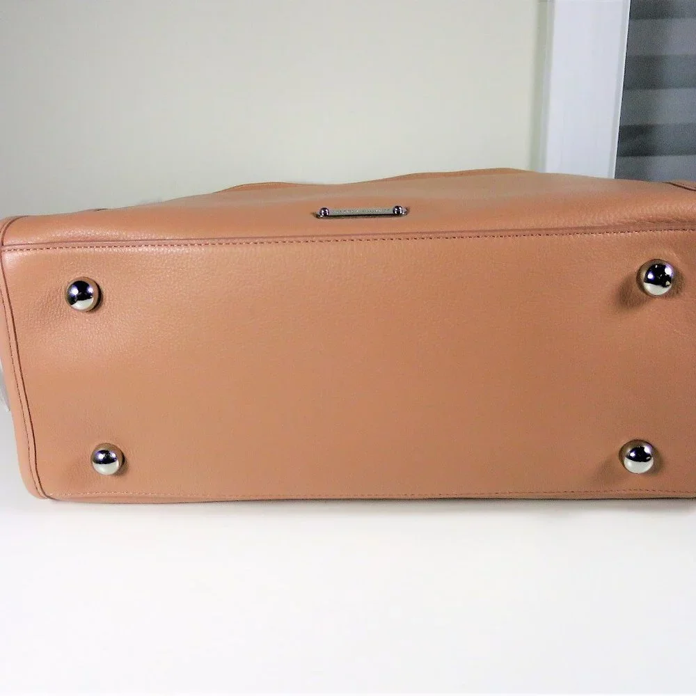 Rebecca Minkoff disclaimer color